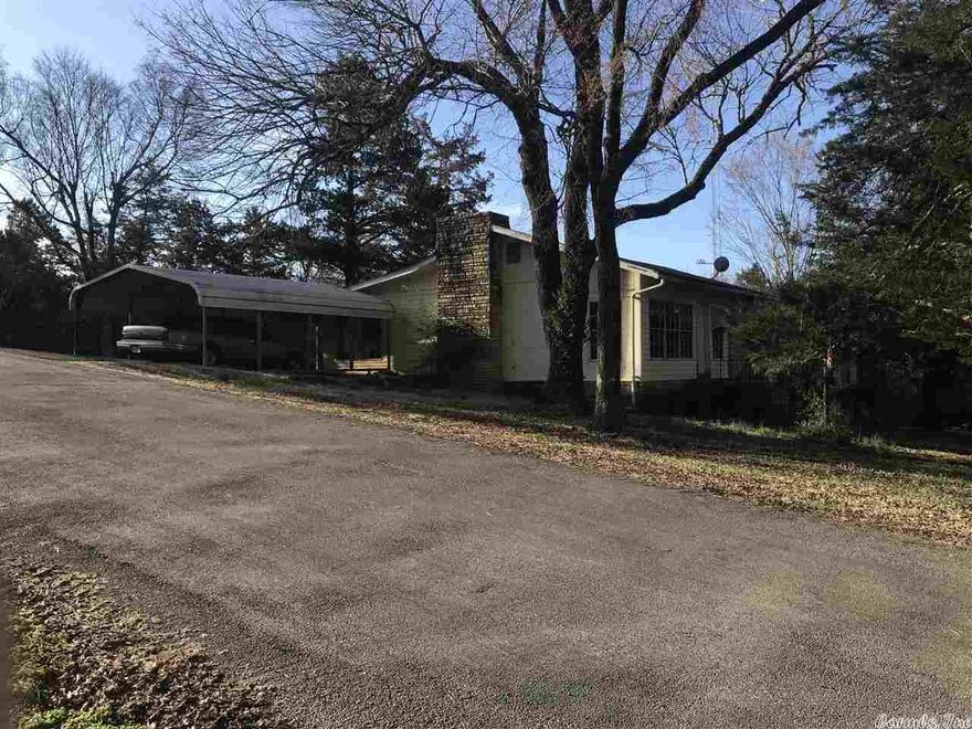 Avail April 1st. Spacious 2 Bedroom 1 Bath with bonus (sun) room.  Large eat-in kitchen with lots of cabinet space and new floor covering.  Large living room with wood-burning fireplace.  Central H/A.  Heat is propane. Cook stove electric. Water heater is propane. Two-car metal carport. Storage room or work shop. Covered patio - all on a corner lot.