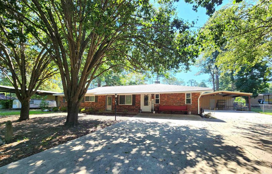 Move-In Ready 5 Bedroom home in Smackover School District! If you have been searching for a spacious home in an established neighborhood, this 2844 sqft brick home offers large rooms and ample storage. Inside, you will find a great room with a vaulted ceiling, custom built-ins and a gas log fireplace. The updated kitchen has a wonderful attached den area- and the layout is condusive to a variety of uses. The spacious kitchen was updated about 12 years ago and boasts custom cabinetry, granite countertops, and stainless appliances. Additional renovations have been made over the last few years including luxury vinyl plank flooring and interior painting. A new roof was installed to this home in July 2025. Some of the home's best assets are outside! Be sure to check out the 19 x 25 metal shop with a huge covered parking area for RV storage, etc, and the additional 2 car carport with a 14 x 21 workshop storage area. This home also offers a 22kw Generac generator installed in 2020. *Please note that the built-in microwave needs repair.
