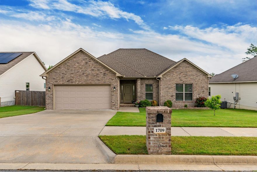 Once you visit this lovely home you will want to make it your own.  You will enjoy the easy living, open floor plan which is great for everyday living as well as entertaining guests. The kitchen offers white cabinets, granite countertops, and stainless appliances including a built-in microwave.  The lovely hardwood floors in the common areas make for easy upkeep.  The primary bedroom and guest rooms are a highly desired split bedroom floor plan.  The back of the house offers a large, fenced backyard with gate and a deck with plenty of room for grilling and entertaining.