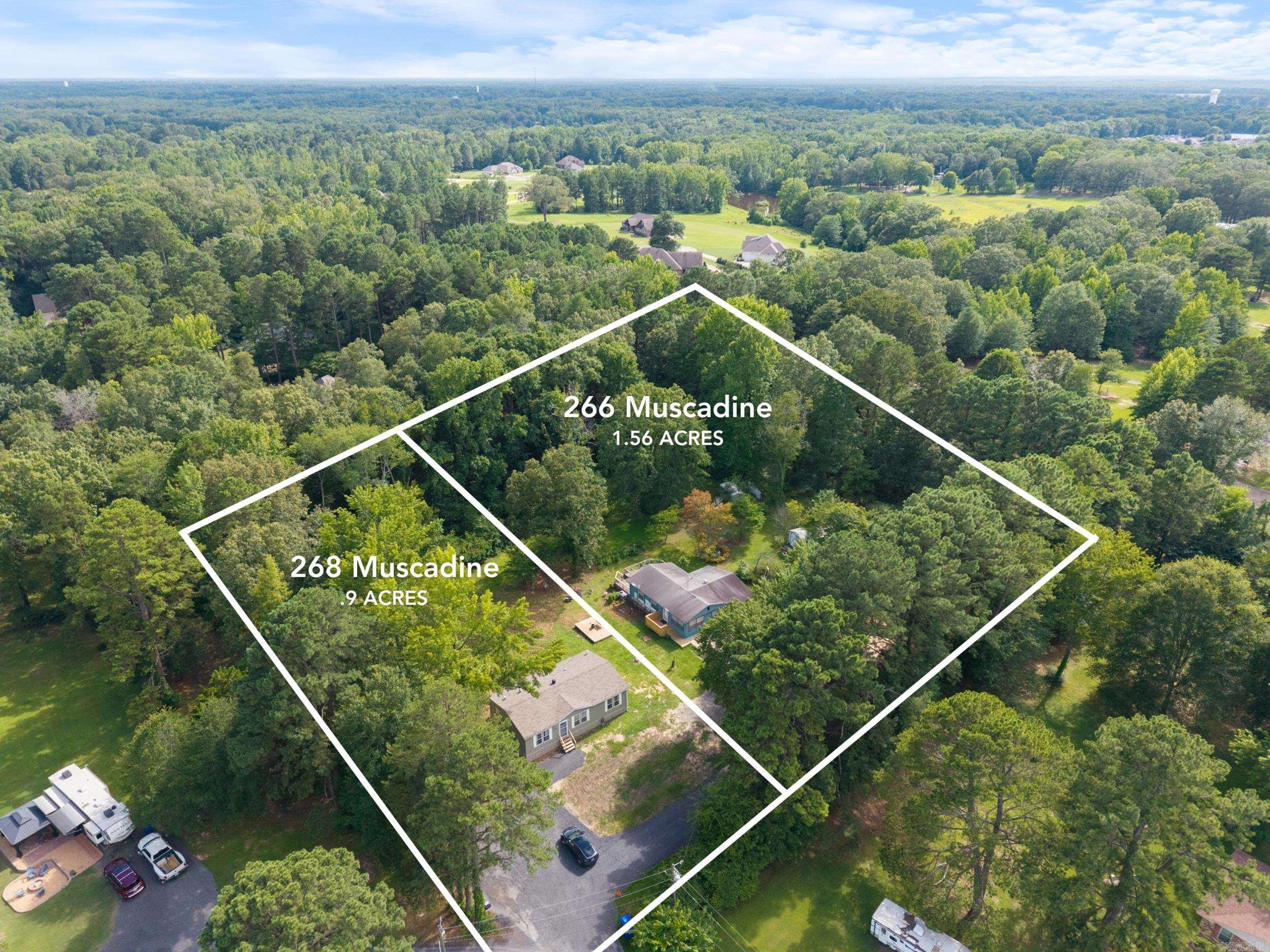 Welcome to 266 & 268 Muscadine Lane in Cabot. These two homes make for a perfect pair of rental properties, settled on a 2.5 acre tract in the middle of town with room to expand. 268 Muscadine is a 2007 3 bedroom, 2 bathroom , 1200 SQFT manufactured home that has been recently updated with new flooring, exterior siding, and appliances. 266 Muscadine Lane is a 1972 3 bedroom , 1 bathroom mobile home that was recently renovated with new paint, flooring, lighting, appliances, bathroom, exterior paint, deck, and more. Appliances currently in each home convey! There is a storm / tornado shelter and storage shed on this property. These two homes have their own utilities, septics, and addresses making them turn-key for any investor!