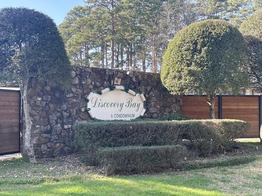 Spend many relaxing hours at this lovely 2 bedroom, 1.5 bath lakefront condo. It is located in the heart of Lake Hamilton. Discovery Bay is conveniently located minutes from Oaklawn Racing Casino Resort, downtown Hot Springs, restaurants, and family-friendly entertainment venues. The lovely setting with the updated swimming pool is the heartbeat of the condo.  This property is perfect for lake lovers and outdoor enthusiasts.  The lake is a few steps from the patio and the covered boat dock is a few feet away from the condo. Across the street is a newly fenced in vacant lot for storing boat trailers. A boat ramp available for Discovery Bay, next to the property. Show with Sentrikey. No nightly rentals.