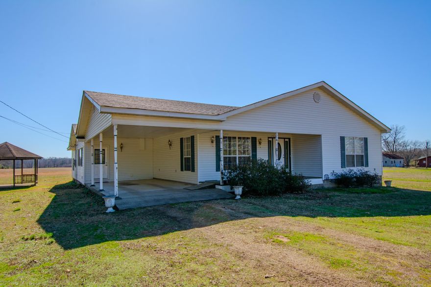 Beautiful country living.  Don't miss the opportunity on this space buy with over 2300 square feet and a backyard overlooking pastureland.  Plenty of space for shop or outbuildings.  this home has a large Primary suite featuring a tiled walk in shower, corner tub and walk in closet.  Large living room great for entertaining.  Flex space with fireplace can be used as a den or formal dining.  Additional bonus room off the kitchen would be a great game room, utility room, or storage.  Oh, and don't forget the office.  Outside enjoy the gazebo for picnics, entertaining, enjoying a cup of coffee and nature.  This is a great opportunity for space and acreage to make it your own.  New roof in 2023, 1 hvac new in 2023 & the other is 7 years old.