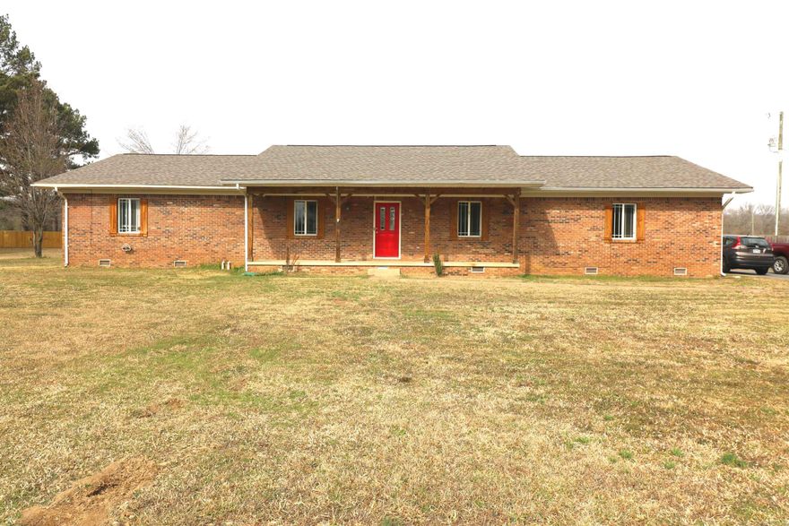 Great county home! This home has all the space, sitting on 1.5 acres, featuring covered front porch and inground swimming pool. Kitchen is updated with granite counter tops, updated cabinets, flooring and fixtures. This home has vinyl flooring in main areas and carpet in the bedrooms. All bathrooms have been updated with tile showers, granite counter tops and fish bowl sinks. 4 large bedrooms with 2 primary bedrooms and 3 full baths. Large back fully fenced yard with covered patio and in ground swimming pool. Detached shop. $10,000 Allowance to be paid to third party of buyer choice at closing, no repairs.  Look today and swim soon!