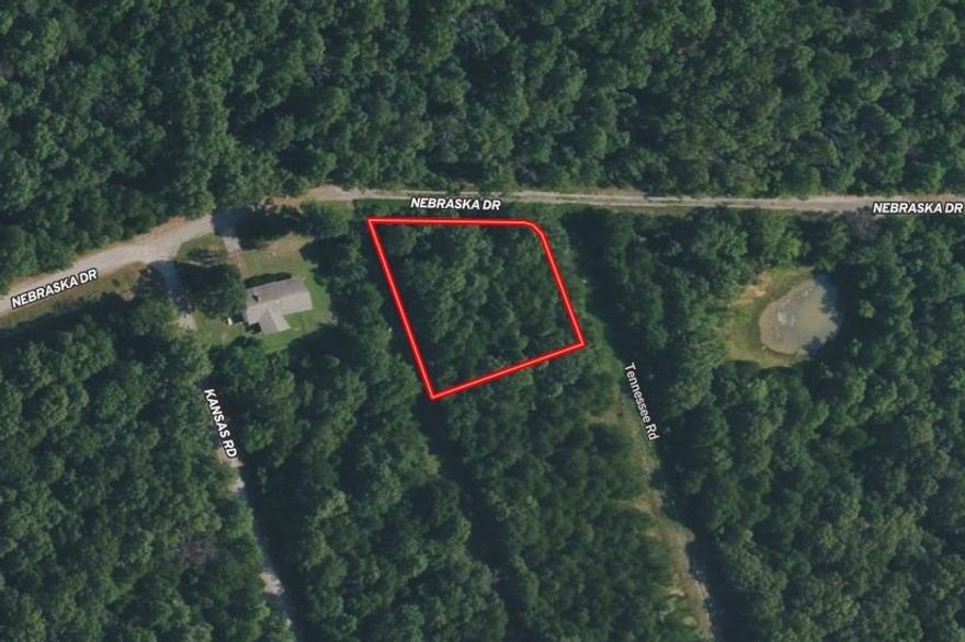 Prime Wooded Corner Lot in Horseshoe Bend, AR Looking for the perfect spot to build your retreat? This residential lot at 1001 S Tennessee Road offers the ideal blend of privacy and convenience in the heart of the Ozarks. Property Highlights Prime Location: A desirable corner lot situated at the intersection of Tennessee Road and Nebraska Drive. Ready for Your Vision: The terrain is nice and flat, providing a versatile building envelope for a custom home. Natural Privacy: Fully wooded, offering plenty of mature trees to provide shade and a natural buffer from neighbors. The Best of Both Worlds: Located in a quiet, serene area where you can enjoy the peace of nature, yet remains close to town for easy access to shopping, dining, and local amenities. Permitting: To ensure your future home is properly situated, a state-approved perc test is required prior to building.