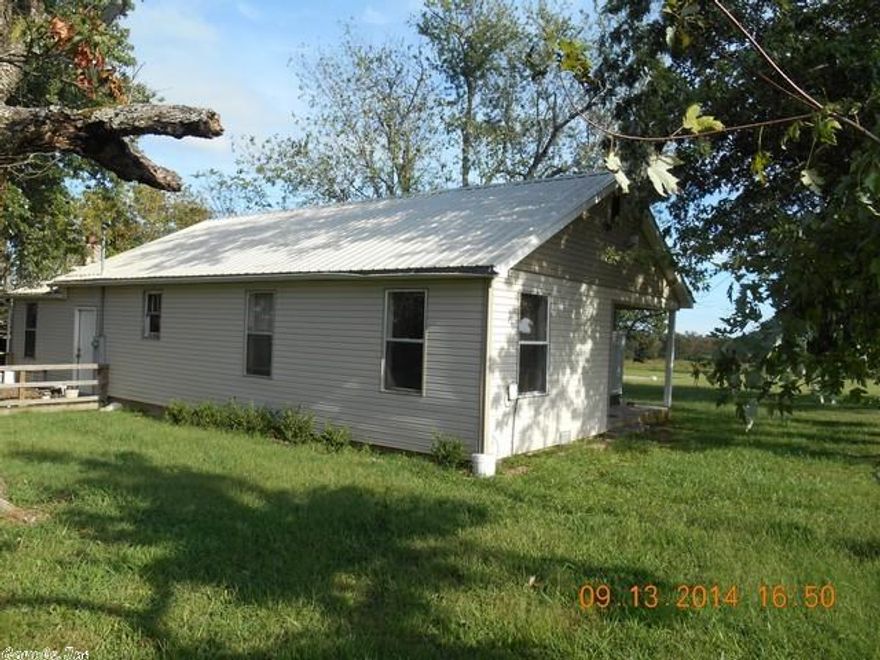 This affordable home in Fox, Ar. area is situated on 1 acre; and has excellent rental potential.  Home offers 3bd./ba., deck, and outbuilding.