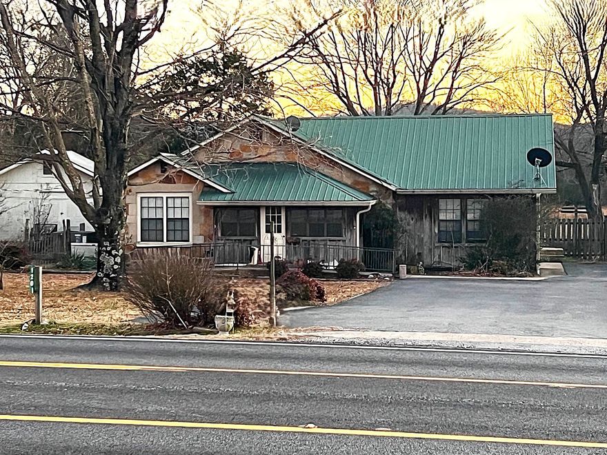 First time on the market! This well-built single story stone home sits on a comfortable partially fenced 0.30-acre lot and offers 1,554 sq ft of potential for a buyer with vision. Featuring 2 beds / 2 full baths, central HVAC and propane heat, comes with an 11kW whole-house Generac generator, the essentials are already in place for reliable everyday living. The home’s interior is functional, with vinyl/linoleum flooring and a layout that invites updating or personalization. The exterior includes a metal roof, pier foundation, and a fantastic 20x16 shop with electric and a/c—perfect for woodworking or storage. If you’ve been searching for a home with strong bones, and great size, this “as-is” property is ready to welcome its next owner. Call us today to schedule your private in person showing!
