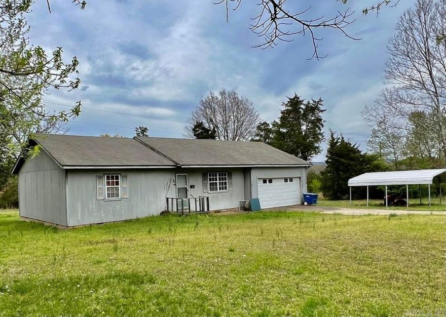 REDUCED IN PRICE BUT NOT IN ITS POTENTIAL!  Ideally Located between Clarksville and Lamar along AR-123 is the perfect 3-acre site and 3 Bedroom 2 Bath Home. This family home built in the mid-1990s has most of its original finishes and provides an excellent opportunity for a Buyer to remodel and make the most of the spacious layout. There is a good-sized storage area/workshop for staging materials. The home is being sold ''as-is'' and is priced accordingly as it is part of the family estate. Offer will be subject to court approval so allow a few days for acceptance.