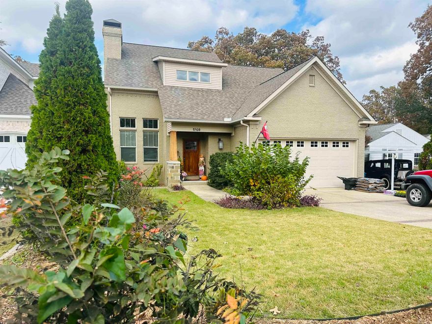 This charming Craftsman style home, built by Flagship Homes in 2009, offers 4 bedrooms, 2.5 bathrooms, and 2350 square feet of space. The inviting covered front porch features a custom wood/stone column, adding to the Craftsman design. The open living and dining room boasts a vaulted cathedral-style ceiling with a tongue and groove wood design. French doors lead to a large, covered balcony overlooking the landscaped backyard from your Dining & Primary Suite.  Primary Suite on Main level! The primary en-suite includes a jetted tub (almost 6'), separate shower, and his/her closets lined in Cedar.    The kitchen is a highlight with custom wood cabinetry, under cabinet lighting, Magna Granite countertops, breakfast bar and island offering lots of space for entertaining & storage! Storage is abundant with walk-in attics and a two-car garage. The backyard is fully fenced with a sprinkler system both front and back and a large spectacular covered back balcony with 3 separate instant gas connections.  Come enjoy the quiet, quaint living that Cammack Village has to offer!  Park, Dog Park, Pool, Tennis and a great Elementary School within walking distance!  Review special features in Pics!