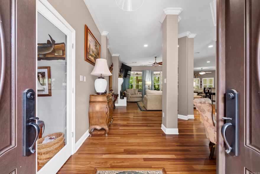 Embrace resort-style living in the heart of Hot Springs National Park! Enjoy access to an 18-hole golf course, swimming pool, pickleball and tennis courts, and a clubhouse with a restaurant and bar. Take your golf cart to your deeded boat slip for a day on the lake. This all-brick home offers 3 or 4 bedrooms, 2.5 bathrooms, a fireplace, high ceilings, hardwood floors, crown molding, and new plantation shutters. The kitchen features stainless steel appliances, a double oven, extra counter seating, a large island, a spacious pantry, and a freestanding ice maker—perfect for boat trips or entertaining. The primary suite boasts large windows, access to a remodeled porch, a spa tub, double sinks, and roomy his-and-hers closets. The expansive living room includes a fireplace, surround sound, and porch access leading to a newly renovated deck. Enjoy the backyard oasis with a basketball court, fire pit, and space for a pool. A 10-ft access gate allows for RV or boat storage. Recent updates include a new roof (April 2025), HVAC, gutters, and septic system. Live in the peaceful, gated community of Diamondhead, just minutes from Lake Catherine State Park and scenic hiking trails! Call today!