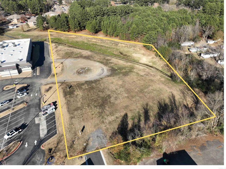 This 3.03-acre commercial parcel offers a prime opportunity for immediate development. The site is cleared, leveled, and build-ready, significantly reducing upfront site work costs and timelines. Utilities are readily available, streamlining the path from planning to construction. With ample space for a variety of commercial or mixed-use projects, this property is well suited for investors or developers seeking a turnkey site with strong development potential.  The parcel adjacent to Harps Food Stores on East Oak Street in Conway is positioned on one of the city’s primary commercial corridors (Highway 64 E), directly tied into a busy retail node anchored by the grocery store and surrounded by established commercial traffic.