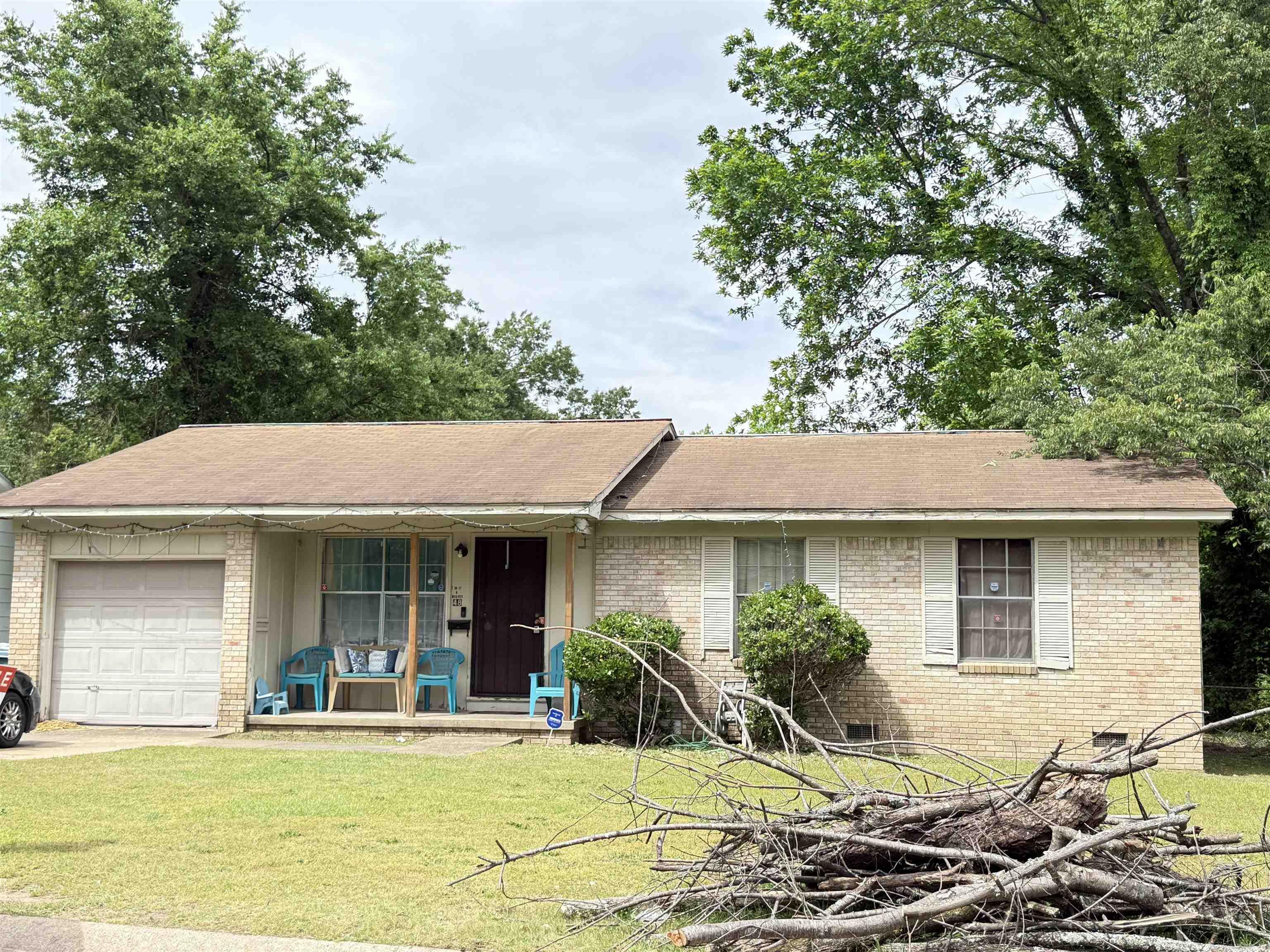 Cute home on a corner lot. All brick exterior. One car carport. Fully fenced yard. House is in a trust so no repairs, Sold "as is" Agents see remarks for required wording in offer and no property disclosure available. This home is tenant occupied but easy to show