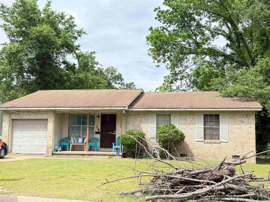 Cute home on a corner lot.  All brick exterior.  One car carport.  Fully fenced yard.   House is in a trust so no repairs, Sold "as is"  Agents see remarks for required wording in offer and no property disclosure available.  This home is tenant occupied but easy to show
