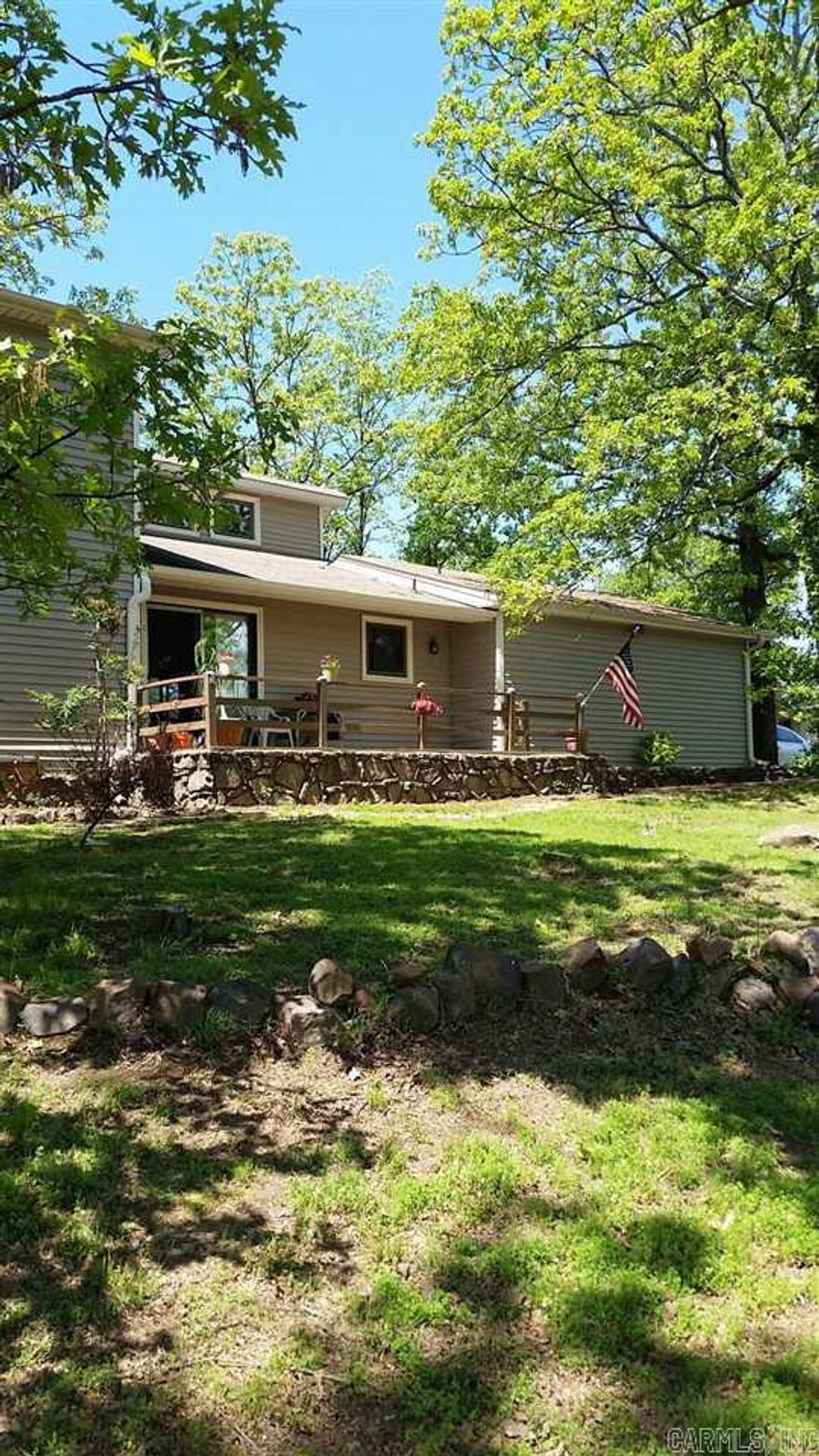 Cute, clean, and now available! Contemporary home, open floor plan, in a great neighborhood. Wet bar, huge vaulted ceilings, stone fireplace.  Large closets in bedrooms. Very clean home with lots of natural light. Beautiful big corner lot with mature trees.   Newer windows and siding , NEW BACK DECK.  This is a great home  that won't last long! Call 501-312-8200 to schedule showing!