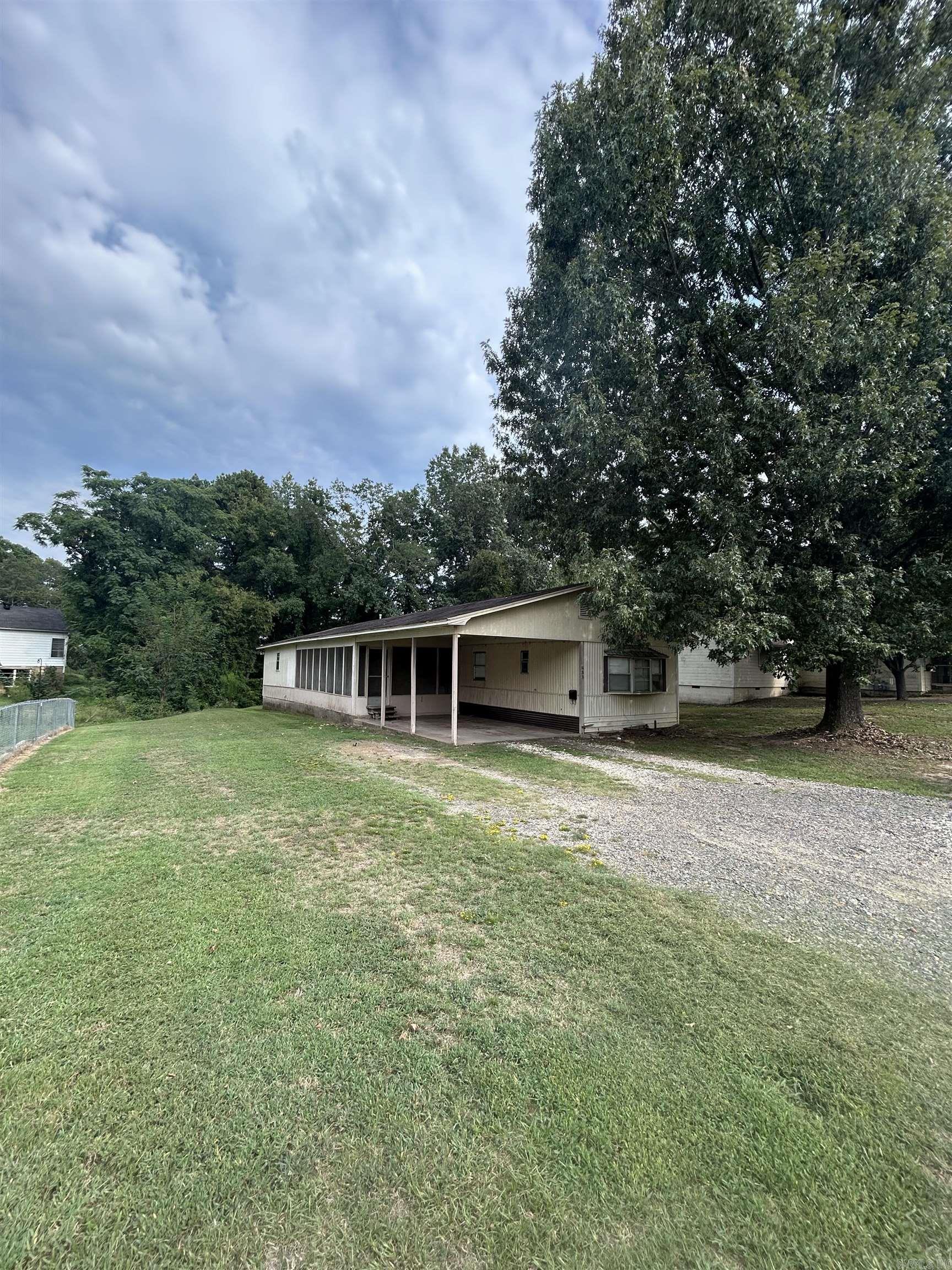 This well-kept 4 bed, 2 bath mobile home offers comfort and updates. Step inside to find a fresh interior with new subfloor and flooring (September 2025), plus a 2 year old HVAC unit for efficiency and peace of mind. Enjoy the convenience of a large carport and relax year-round on the screened-in porch. All appliances remain, making this home ready for its next owner. Previously used as a rental property or the past 3 years, it's a fantastic option for both homeowners and investors looking to expand their portfolio!