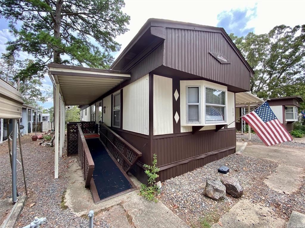 TIMBERCREST... 2 Bedroom 2 bathroom 55+ community, all appliances convey including washer & dryer, all window coverings convey, spacious covered parking for vehicles, fencing for that pet, lots of covered deck & back porch with privacy. Exterior updating with new paint & hand rails.