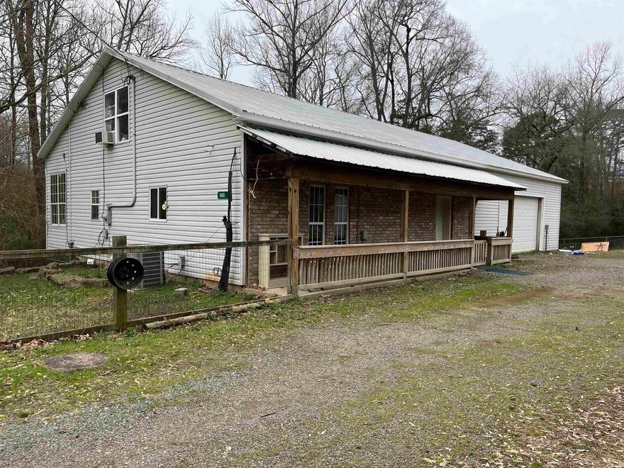 Fixer upper in Clinton city limits on 2.37 acres.  Home needs work to be move in ready.   Very spacious with large garage.  Also has a 48 X 16 detached garage.  Home has a bedroom downstairs and one bedroom upstairs rest of upstairs is unfinished). Large screened in porch on back of home, plus a covered porch. So many possibilities!!!