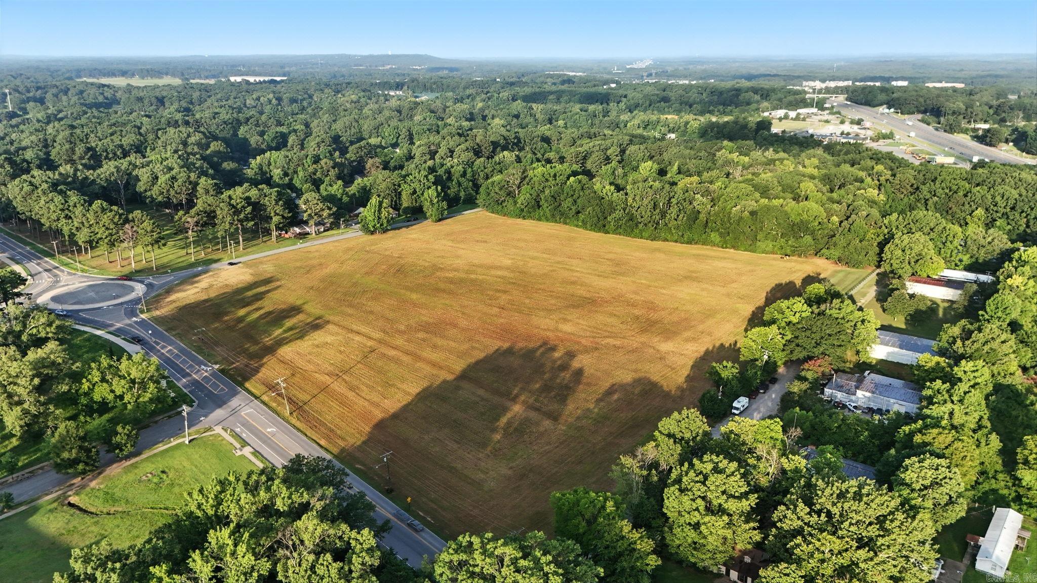 Attention developers: 17.05 acres inside city limits with commercial C3 zoning and utilities at the street. No matter what your plan is, this site offers the flexibility and location to bring your vision to life. Located just across the roundabout from Little Rock Southwest High School and only .6 miles from I-30!