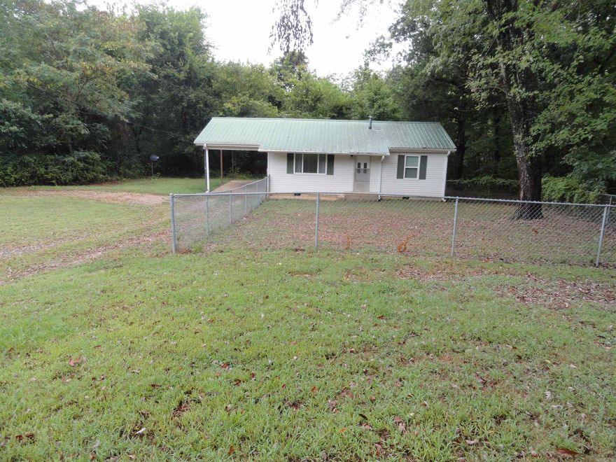 Charming 2 bed, 1 bath home in Marshall, AR with many updates! Features include a carport, brand new double pane vinyl windows, metal roof, & vinyl siding—making it low-maintenance for years to come. Enjoy a fenced front yard perfect for kids or pets, plus an extra cleared unimproved lot that adds space and potential. Inside, you’ll find real wood floors in the living room, hallway, & both bedrooms, while the kitchen, utility room, & bath feature durable vinyl flooring. Central heating and cooling provide comfort year-round. Located in the heart of the Ozark Mountains, Marshall offers small-town charm and quick access to endless outdoor adventures. 15 minutes to Buffalo National River and close to four major lakes and thousands of acres of National Forest, this area is ideal for horseback riding, ATV riding, hiking, swimming, fishing, hunting, canoeing, kayaking, floating, and boating. A wonderful place to call home or a great weekend retreat or use it for an income producing property by nightly or monthly rental.