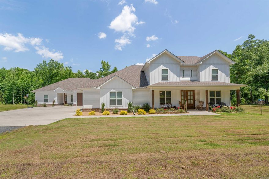 This Gorgeous Custom Menco Construction Built Home has it all, sitting on 10 acres. Fall in love as you walk in the double front doors into a large entry way. Main home consist of 4 Bed 3 full bath, Master and 1 down and 2 upstairs w/a bonus area. Extra room down would make a great office, it connects to a full bath. Formal Dinning area, Amazing Kitchen w/ huge Island, Double ovens, Lots of cabinets, Large Pantry w/microwave, Floating Shelves and a farmhouse sink that overlooks the back yard. Kitchen flows into a big Living Area with Rock Fireplace, double doors going out to a big covered back porch. Master Bedroom has a beautiful accent wall, master bath to die for, Huge walk in shower, cast iron soaker tub and double vanities enters into an amazing master closet that opens up to Laundry and mud room. The Master Closet has a door that you can use to enter the In Law quarters from inside, in law space also has its own Garage and Front door entrance. In law quarters has a Stunning Kitchen, built in table/bar, Large LR, Bonus room for office or crafts, master, master bath, closet includes Laundry area, 1/2 bath and its own covered Patio.   sq ft est, pls measure, agent remarks!!