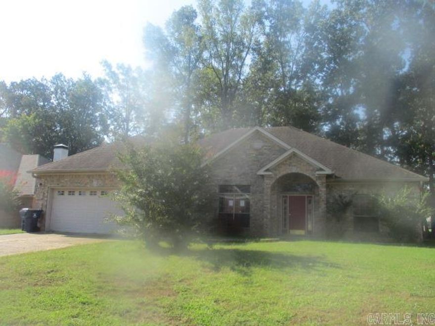 Located off the corner of Montpellier Dr and Deauville Dr in Maumelle city limits features this home with three bedrooms two bathrooms. Built in 1999 this brick home has a separate dining room and sun room. The tray ceiling in the primary bedroom is a nice bonus. Home is in the Country Club of Arkansas Subdivision. Call today for details... log on www.hudhomestore.gov to submit offers and www.olympusams-at.com for management information. HUD case #031-568582 - "HUD homes are sold AS IS".