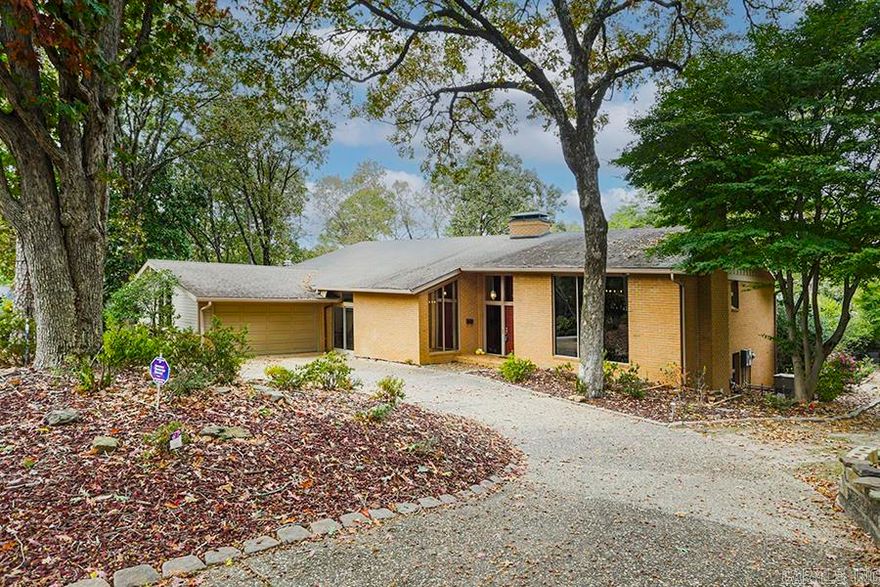 Welcome to this stunning one-owner home nestled in the trees of the highly sought-after Robinwood neighborhood. This spacious and meticulously maintained residence offers a wealth of luxurious features that are sure to impress such as premium cabinetry and whole house generator. With a prime location on a tranquil cul-de-sac and an expansive half-acre lot, this property provides the perfect blend of privacy and convenience. The main level offers a true showpiece of a living room, featuring beautiful wood beams and a cozy fireplace, making it an ideal space to relax. The separate DR is adjacent to the bright kitchen with large island, refrigerator and enclosed sunroom. On the lower level you'll find the large great room w/FP, wet bar, tv den, billiard room (complete with a pool table), impressive home office with extensive built-in shelving and sitting area that could also be repurposed for a 5th bedroom, if needed. There is also a huge laundry room complete w/washer/dryer & ironing board. The upper level boasts 4 bedrooms and 2.5 baths rounding out the private spaces for the family. Homes like this one don't come up very often, if you've been waiting, this is it!  Welcome home!