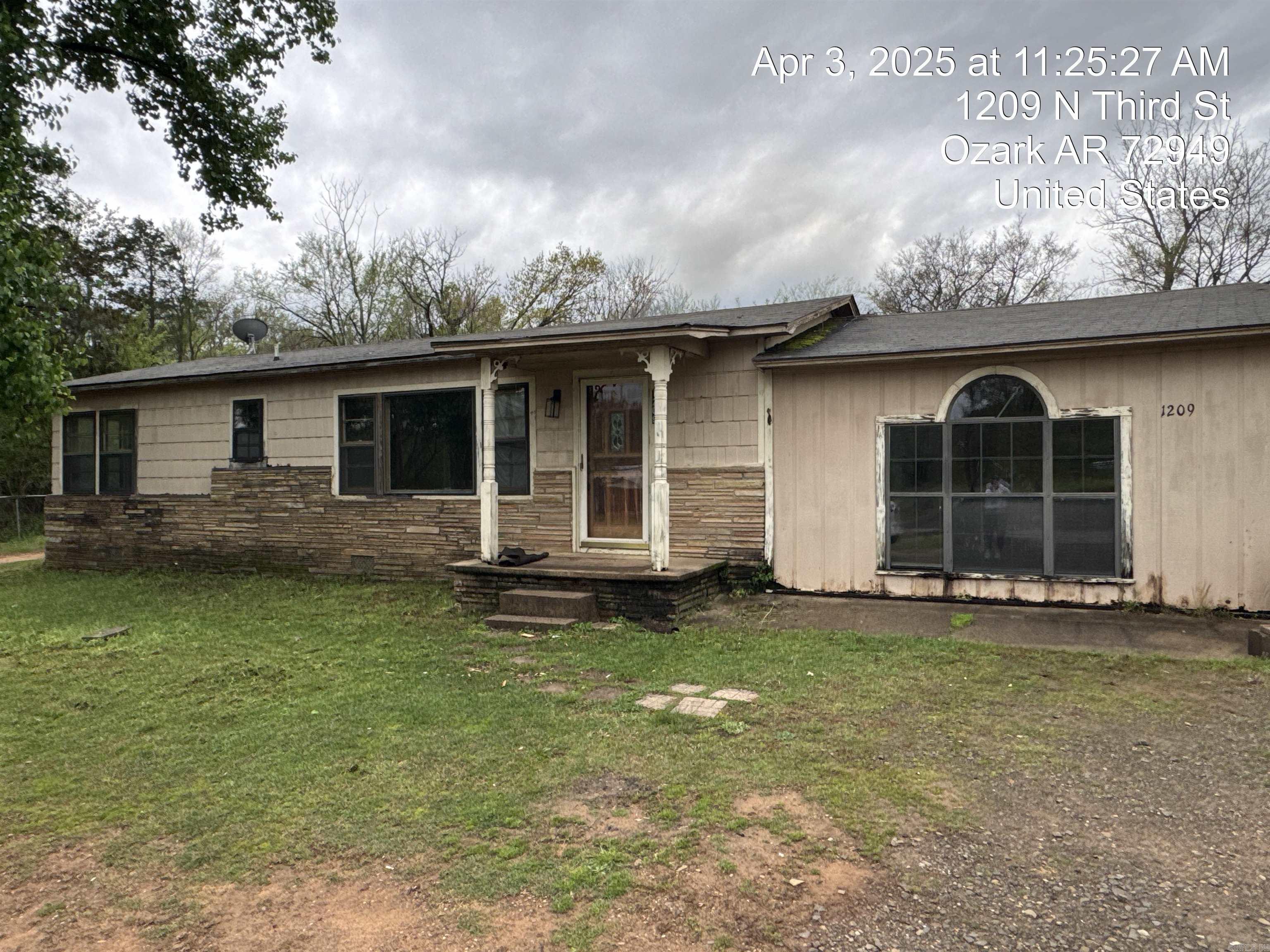 This spacious three bedroom two bathroom home in Ozark AR is full of potential! With 1906 square feet of living space, it is a perfect opportunity for investors, flippers, or handy buyers looking to create their dream home. The layout includes a large living area, separate dining space, and a roomy kitchen, all waiting for your personal touch. The bedrooms are generously sized, and two full bathrooms add comfort and convenience. Situated on a sizable lot in the heart of Ozark, the property offers a great balance of small town charm and easy access to local schools, shopping, and outdoor recreation in the Ozark Mountains. This property may also be marketed via an auction event at <auction site> (void where prohibited). The Seller will review offers submitted through the auction site as well as through the listing agent