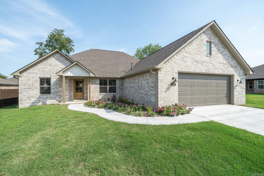 10217 Tyrell Ct, Fort Smith, AR 72916.  Located in Fort Smith's Shire Glen Subdivision at Chaffee Crossing, this Justin Green Custom Home offers 4 bedrooms, 3 bathrooms, and 2,160 sqft of thoughtfully designed living space. Highlights include luxe quartz countertops, durable wood and tile flooring, an open living and kitchen layout, a split floor plan, and a covered back porch.   Built with advanced energy-efficient features—from high-performance insulation and windows to modern HVAC systems—this home is designed to provide year-round comfort while reducing utility costs.   As an added assurance, Justin Green is offering a 3-year builder warranty – making this home a smart investment in one of Fort Smith’s most desirable communities.  Call today to schedule your showing! Justin Green Custom Homes: Honesty and Integrity Built into Every Home.