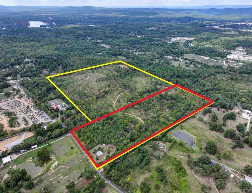 20 ACRES OF PRIME LAND WITH EXISTING HOME and Development Potential minutes from Downtown Hot Springs!  This 20-acre property with a pond is perfect for your secluded dream home for peaceful country living or homesteading dream.  There's already a gated entrance in place and an access point from Fleetwood.   The pond near the entrance adds charm & appeal, making it a standout feature.  The home on almost an acre of frontage on Fleetwood Rd has been completely renovated and is move in ready for it's new owner! Custom cabinets, new floors, paint, butcher block countertops. The home alone could possibly rent for $1000-$1500 a mo.   The land offers endless possibilities for developers or investors too! Only 15 minutes from Downtown Hot Springs! Whether you're looking to create rental incomes or a private retreat, this property is an ideal investment opportunity in our growing community. COME AND SEE!!   **Seller financing is available to qualified buyers.  An additional 40 acres is also available. See MLS #24036740.  Agents - Call Showing service to schedule all showings.