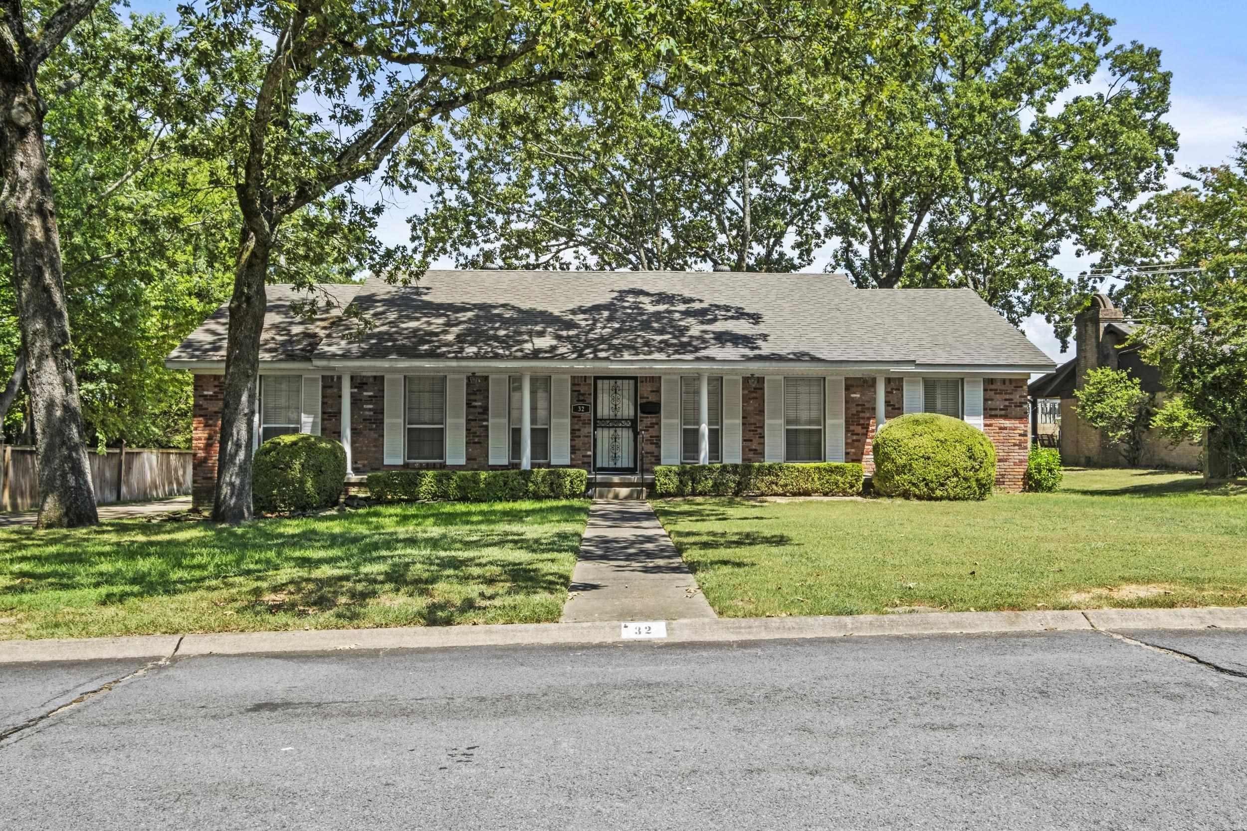 Welcome to this charming classic Lakewood home on a spacious 0.37-acre double lot with lush St. Augustine grass and a full sprinkler system. A relaxing front porch spans the entire width of the houseāperfect for morning coffee or evening chats. Inside, you'll find gorgeous engineered wood floors, large bedrooms, and an updated kitchen with Silestone countertops and modern appliances. The laundry room offers plenty of storage and pantry space. The garage has been thoughtfully converted into a fourth bedroom with a full bath and private entranceācurrently used as a successful short-term rental, but also ideal as an in-law suite, teen hangout, or luxurious private master. So many possibilities! Other highlights include leaf guard gutters, an outdoor storage building, and ample driveway parking for multiple vehicles. A rare opportunity to own a well-maintained home with flexibility, space, and income potentialāall in the heart of Lakewood!