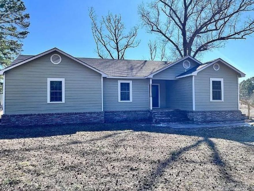 Beautiful, updated home with 3 Bedroom 2 Bath sitting on quiet 3 acre  property.