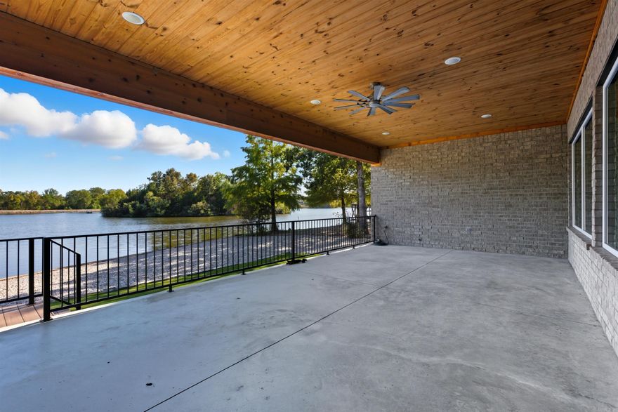 Lake Sophia unbeatable modern lakefront luxury just built in 2022. This 3,292 sq. ft. home offers 4 spacious bedrooms and 4.5 baths, plus a media room, all designed for comfort and style. The chef’s kitchen features a full suite of Viking appliances, while the open living spaces showcase lake views that steal the show. The primary bedroom has his and her closets spacious bath and a gorgeous view! Step outside to 178 feet of pristine seawall—perfect for quiet mornings or sunset evenings by the water. Two 2-car garages provide ample space for vehicles and lake toys, plus a safe room and buried propane tank with whole-house generator ensure peace of mind year-round!