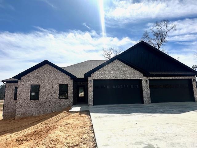 Sitting on 1.38 acres, this beautiful new construction is located in Winchester Estates in Bauxite School District! It Features 4- bedrooms, 2- bathrooms, with a 4-car garage, perfect for extra storage or projects!! Open/ Split floor plan, luxury vinyl flooring throughout, stainless steel appliances in the kitchen, and fireplace for those chilly nights. The primary suite features a large walk-in closet, beautiful walk-in tile shower, soaking tub and his-and-her vanities! This home is the perfect blend of country living, style and functionality! $5000 BUILDER INCENTIVE WITH AN ACCEPTABLE OFFER!!