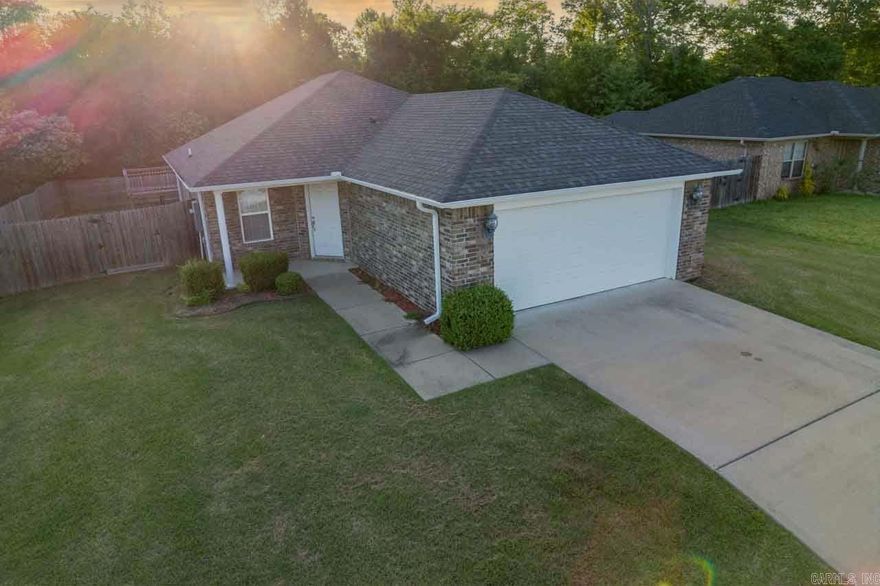 Welcome to this charming 3-bedroom, 2-bathroom all-brick home located just minutes from shopping, restaurants, schools, parks, and other local amenities. This home offers an open concept layout, perfect for modern living and entertaining. The kitchen and living areas flow seamlessly together, creating a spacious and inviting atmosphere. Recent updates include a newly replaced roof, providing peace of mind for years to come. The primary bathroom features an upgraded, handicap-accessible walk-in shower for added convenience and comfort. Do not miss your opportunity to own this well-maintained home in a highly convenient location. Schedule your showing today. Agents see remarks.