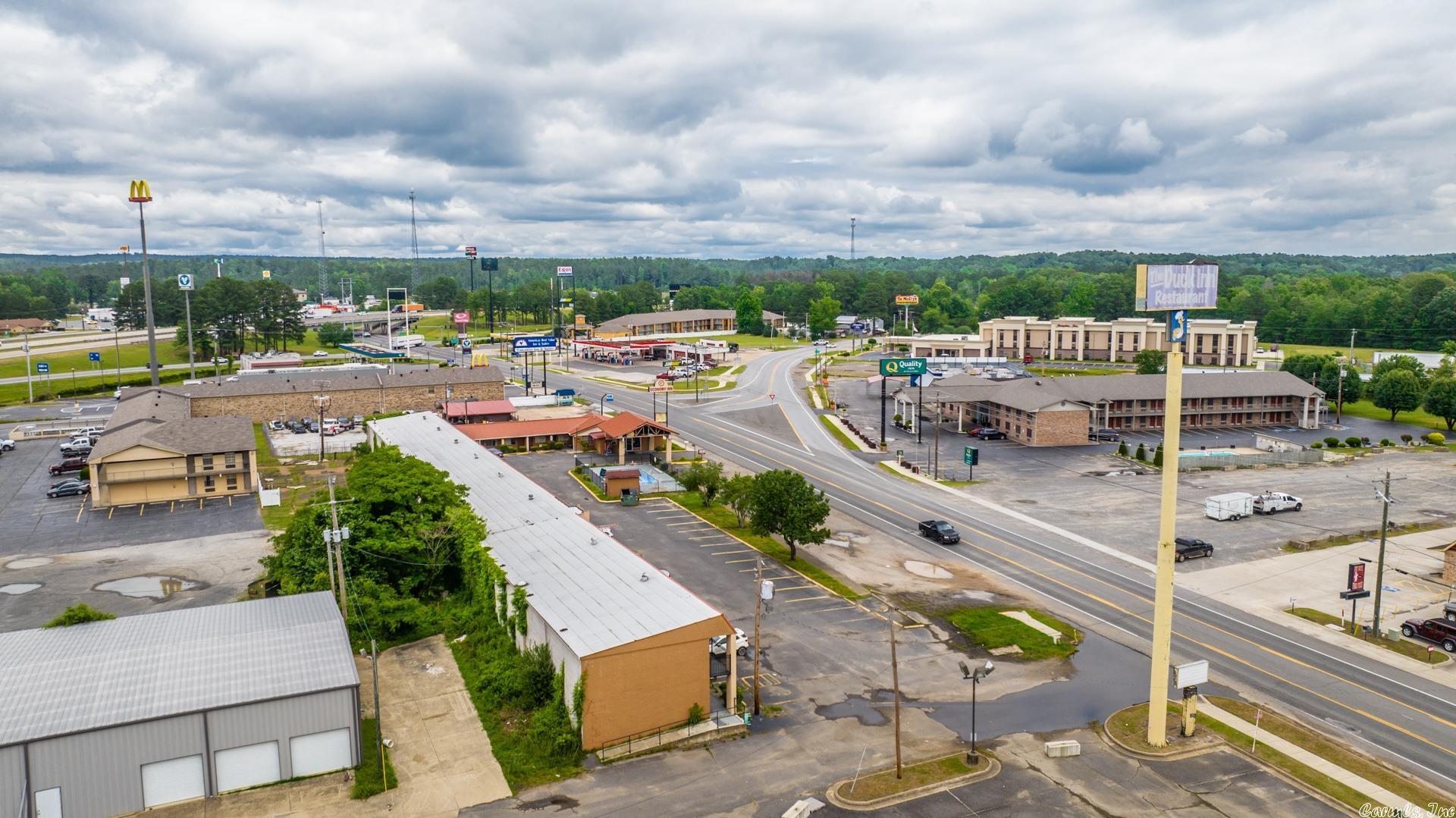 Conveniently located on Caddo Valley Road. Situated on a generous plot of land with 348 feet of road frontage, this motel presents an exciting investment opportunity for those looking to make their mark in the hospitality industry. While the motel may require some work, it offers immense potential to be transformed into a thriving business. With its prominent location along Caddo Valley Road, the motel enjoys excellent visibility and easy access for travelers passing through the area. Its expansive road frontage provides ample space for advertising and attracting potential guests. The motel features a range of rooms, each providing a comfortable and inviting space for weary travelers. Although a little renovation might be necessary to bring the rooms up to modern standards, the solid structure and existing infrastructure make it a fantastic starting point for revitalization. Additionally, the motel's surrounding area offers a multitude of attractions and amenities. Arkadelphia boasts a charming small-town atmosphere with a welcoming community and a range of local businesses. The region is known for its natural beauty, with pictures