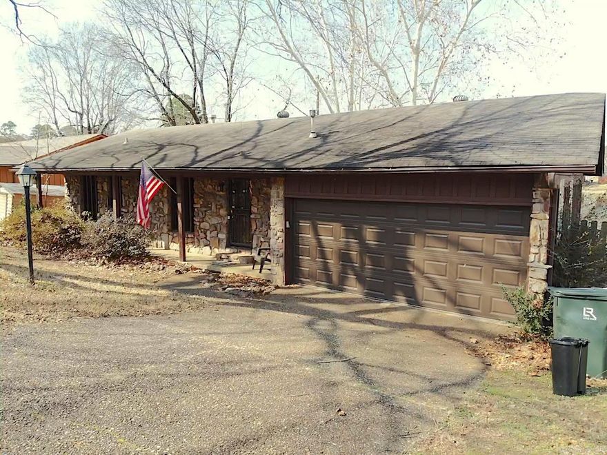 Lakefront home in Little Rock featuring 3 bedrooms and 2 bathrooms with approximately 1,050 sq ft of heated and cooled living space plus a 390 +/- sq ft attached garage. Spacious living room and functional dining/kitchen combo with all appliances conveying. Enjoy beautiful lake views from the back deck — perfect for feeding ducks, relaxing, or kayaking. Baptist Health Medical Center-Little Rock is visible from the property and located approximately 0.3 miles away, offering convenient access to major medical care. Waterfront setting with city convenience — centrally located near shopping, dining, and services, ready for the next occupant to enjoy.