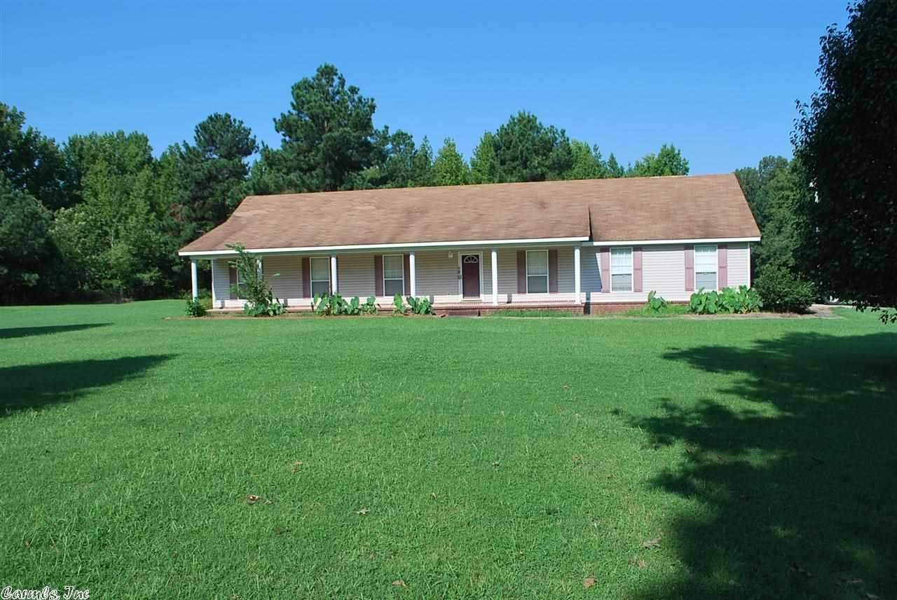 Country at it best! Close to town with rural atmosphere. 4 Bedroom, 2.5 baths; large master bath features jetted tub, double vanity, his & her closet, plus water closet. All this on 1.84 acres. New Metal Roof!! SEE AGENT REMARKS!!!