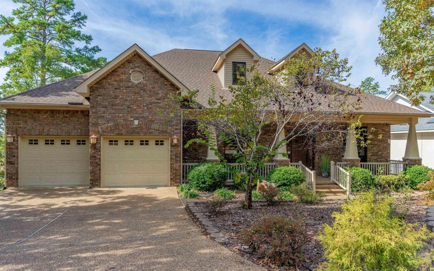 Desirable Craftsman style architecture, East end, overlooking Balboa Lake. This three bedroom, 2-1/2 bath, one story home with level driveway has front porch curb appeal and deck from which to enjoy the Fall colors and lake. Game room downstairs, heated/cooled with separate system and lower level entrance - 1/2 bath is downstairs. Features include two separate offices, 10' and 12' ceilings, solid wood doors, huge pantry, Tankless Water Heater, Corian counter tops and wood blinds. SEE AGENT REMARKS