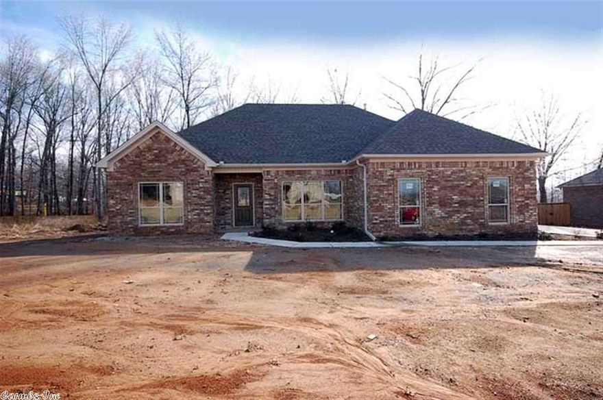 Curb appeal at it's best,all brick home in the sough after Shadow Creek Subdivision,Cabot Schools,4 bedroom 2 bath,split floor plan,w/formal dining room,huge open kitchen w/lots of storage and plenty of prep space,granite countertops tile backsplash,stainless appliances,large eat in kitchen area, w/access to partially covered deck/porch,Master has hardwood floors tray ceiling,double sink vanity,sep shower & jetted tub w/arge master closet.Living room offers a fireplace and hardwoods, this is a must see home