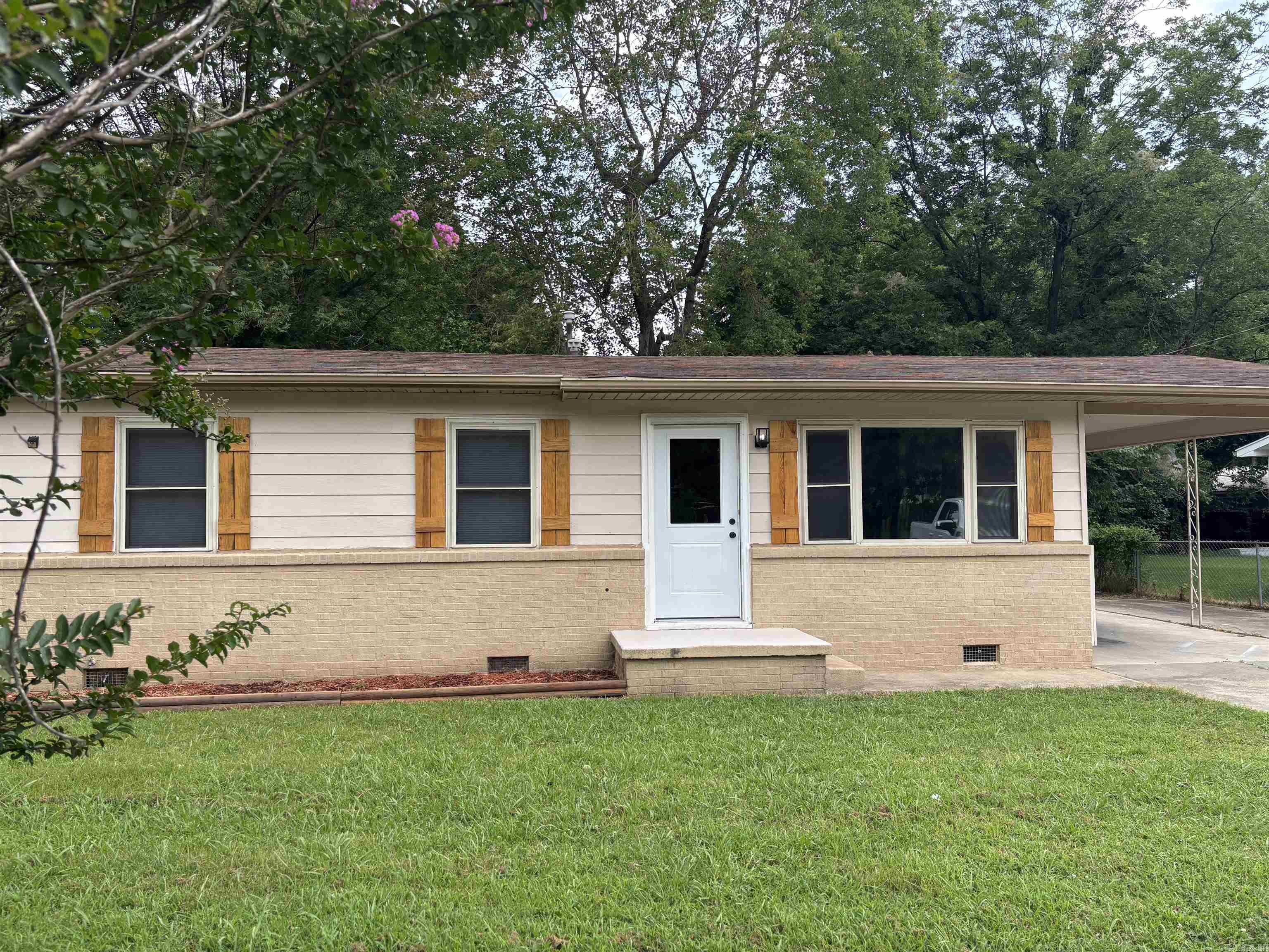 Completely remodeled 3 bed, 1 bath home with 1240 sq ft of living space! This move-in ready home features an open concept floor plan, new HVAC, new hot water heater, new plumbing, new lighting, and new flooring throughout. The kitchen offers beautiful butcher block countertops, and the bathroom includes a ceramic tiled shower. Enjoy hardwood and laminate flooring throughout the home. The fully fenced backyard provides privacy and includes a 16x20 storage shed for extra storage or workspace. Don't miss this onepacked with updates and ready for new owners!