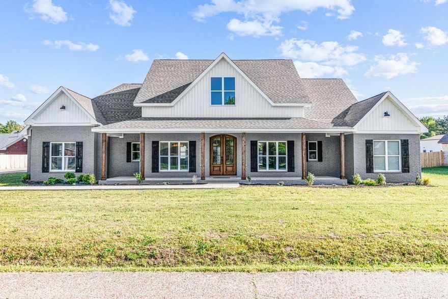 This luxurious 4 bedroom, 3.5 bath home is a stunning example of modern living at its finest. The open split bedroom floor plan provides plenty of space. As you step through the double wooden doors, you have a jaw dropping view of the kitchen that's a chef's dream, featuring a large island with seating, a gas stove, and a pantry for all your storage needs. From the kitchen, you can view the dining area and living room, making it easy to entertain guests while preparing meals. The fireplace in the living room is the focal point of the home, providing warmth and a cozy atmosphere. Off the living room, you'll find a stylish and functional office, perfect for working from home. The primary bedroom is large and the primary bathroom features double vanities, a soaking tub, and a tiled walk-in shower, making it the perfect place to unwind after a long day. When you step outside onto the covered patio, you'll be greeted by yet another fireplace, perfect for keeping warm while enjoying the beautiful outdoor views. Two of the bedrooms on the other side of the home share a bathroom with double sinks. Finally, the 3-car garage provides ample space for cars, storage, and other items.