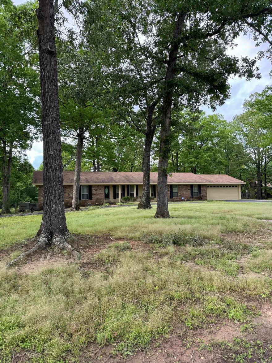 You'll fall in love with this spacious Ramble Estates Gem,  lots of square footage with room to grow and stretch your decorating/updating skills.  Roomy Ranch style with beautiful hardwood. Masonry gas log fireplace. 1.39 acre fenced with large shop.  Covered patio, central heat/air. updated kitchen appliances, (refrigerator stays) formal dining room/living room, separate den and a huge family/recreation room, bonus room great for office or hobby. Note:  Any contract subject to probate court approval