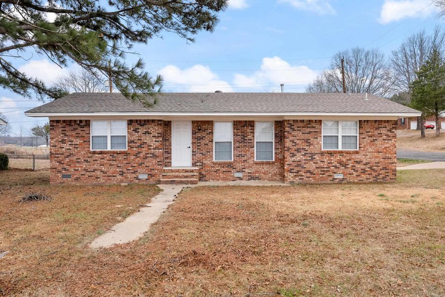 Great Starter home.  Recently updated with new roof, HVAC, water heater, water service, main sewer line, appliances, fixtures, paint and flooring.  Nice back yard. Lot behind house can be purchased with home at additional cost.