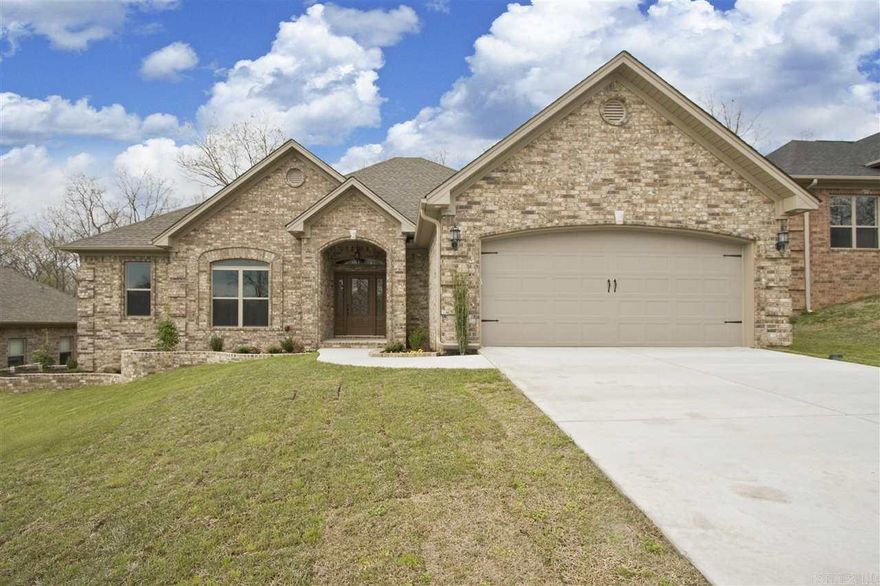 TALK ABOUT A GORGEOUS,VERY WELL CONSTRUCTED HOME W/BUILDER PAYING CLOSE ATTENTION TO EVRY DETAIL..ITS ALL HERE IN THIS VERY OPEN,WELL-LAID OUT FLOOR PLAN.BEUTIFEUL HRDWOOD FLOORS,GORGEOUS GRANITE W/GLASS TILE BACKSPLASH,WALK-THRU LAUNDRY W/TONS OF BUILT-IN STORAGE CONNECTED TO HUGE MST.CLOSET,CROWN MOLDING IN EVERY ROOM,EXTRA INSULATION IN INTERIOR WALLS & ATTIC, WALK- UP STAIRS TO UNFINISHED BONUS/STORAGE AREA,TIERED LANDSCAPING LINED W/BRICK WALL PLANTERS,LARGE COVERED BACK PATIO OVERLOOKING WOODED AREA.