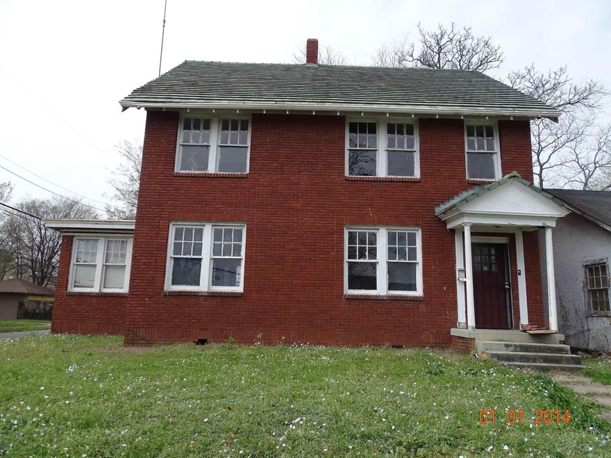 Come make this large house with great bones yours.  This home has original hardwood floors and French doors. Several houses in the area have been revitalized.  This house is being sold as is.