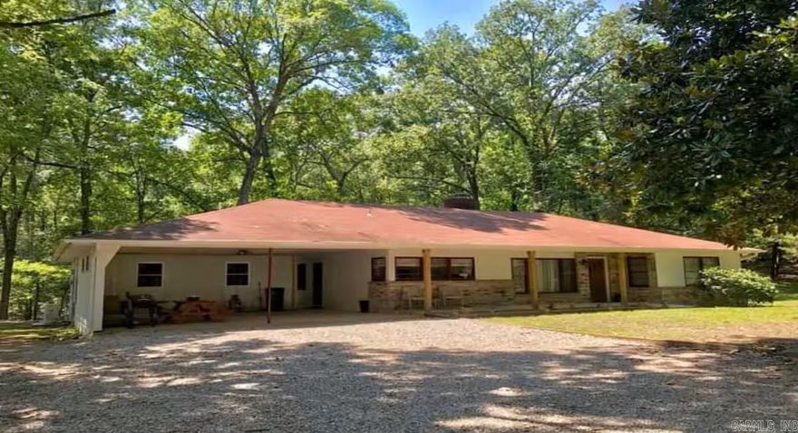 Quiet and secluded ranch style house on 7 acres located only 1.5 miles from Downtown Hot Springs. Backyard connects to North woods mountain bike and hiking trail system. Vintage home with modern amenities. Enjoy rocking on the front porch while enjoying the mountain views of Hot Springs National Park. Relax around the fire pit after cooking dinner on the outdoor grill. Hike Hot Springs National Park Sunset Trail just 0.3 miles. Mountain bike or play disc golf at Cedar Glades Park 1 mile away.