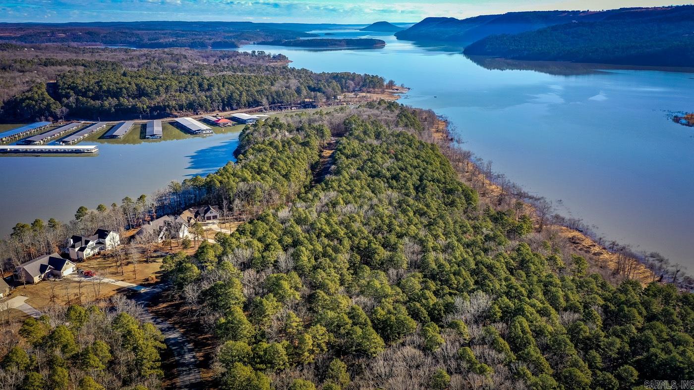BEAUTIFUL SPOT TO BUILD YOUR DREAM HOME ON GREERSFERRY LAKE WITH A GENTLE SLOP TO THE WATER. GATED COMMUNITY. SOME RESTRICTIONS. AGENTS SEE REMARKS
