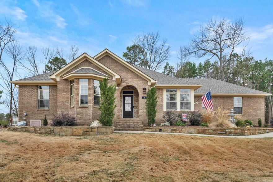 This beautiful 3 Bedroom 2 Bath home with all brick exterior is move in ready.  This home features an inviting open floorplan with an open access kitchen with a cozy banquet for casual meals, a breakfast bar and ample storage.  There is also a separate dining room with views of Lake Hamilton.  The living room centers around the gas log fireplace and has access to the spacious sunroom which will soon become your favorite place to relax while enjoying the natural beauty through the solid glass windows.  New windows treatments have just been added.  The large primary bedroom has an en-suite bath with a Jacuzzi tub and walk-in shower.  The two secondary bedrooms share the updated bath with large walk-in shower.  Both bathrooms have new high efficiency toilets.  The two-car garage has a new epoxy coating which makes clean up a breeze.  The yard has new landscaping and an updated sprinkler system.  A whole house generator, new roof and an instant water heater will keep you feeling safe and comfortable in your new home.  There are many more outstanding features home that you must see.  The home is located in the warm and welcoming neighborhood of Turtle Bay at Driftwood.