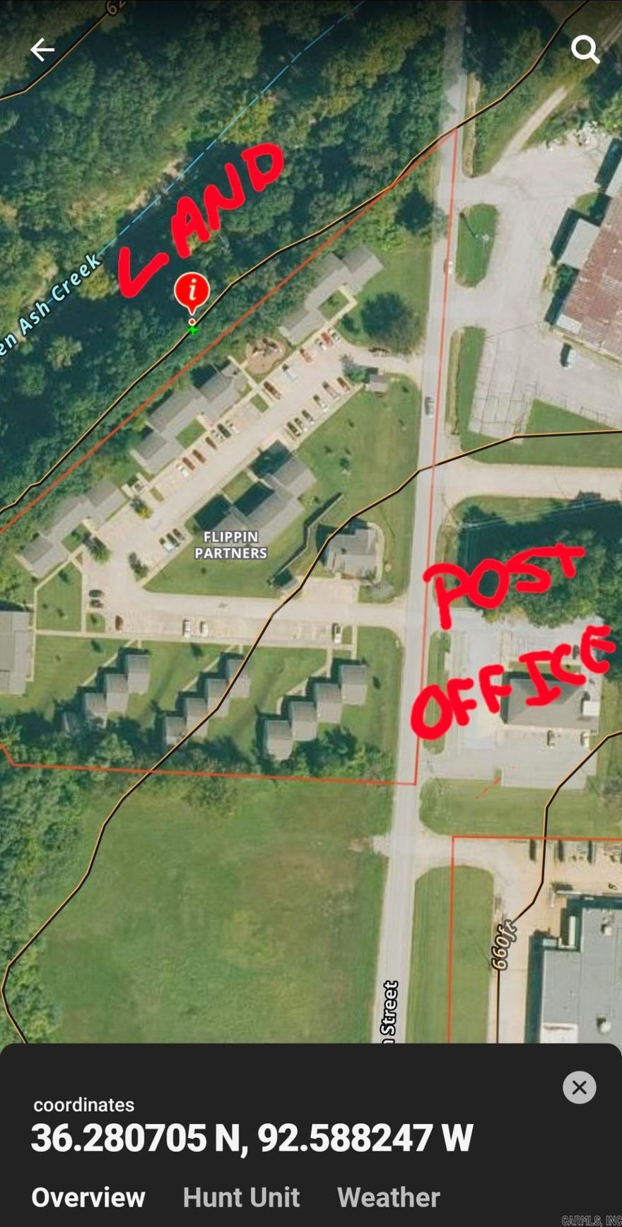 Property sits  behind Flippin Properties on the right. Utilities available.  2.37 ac m/l $15,000