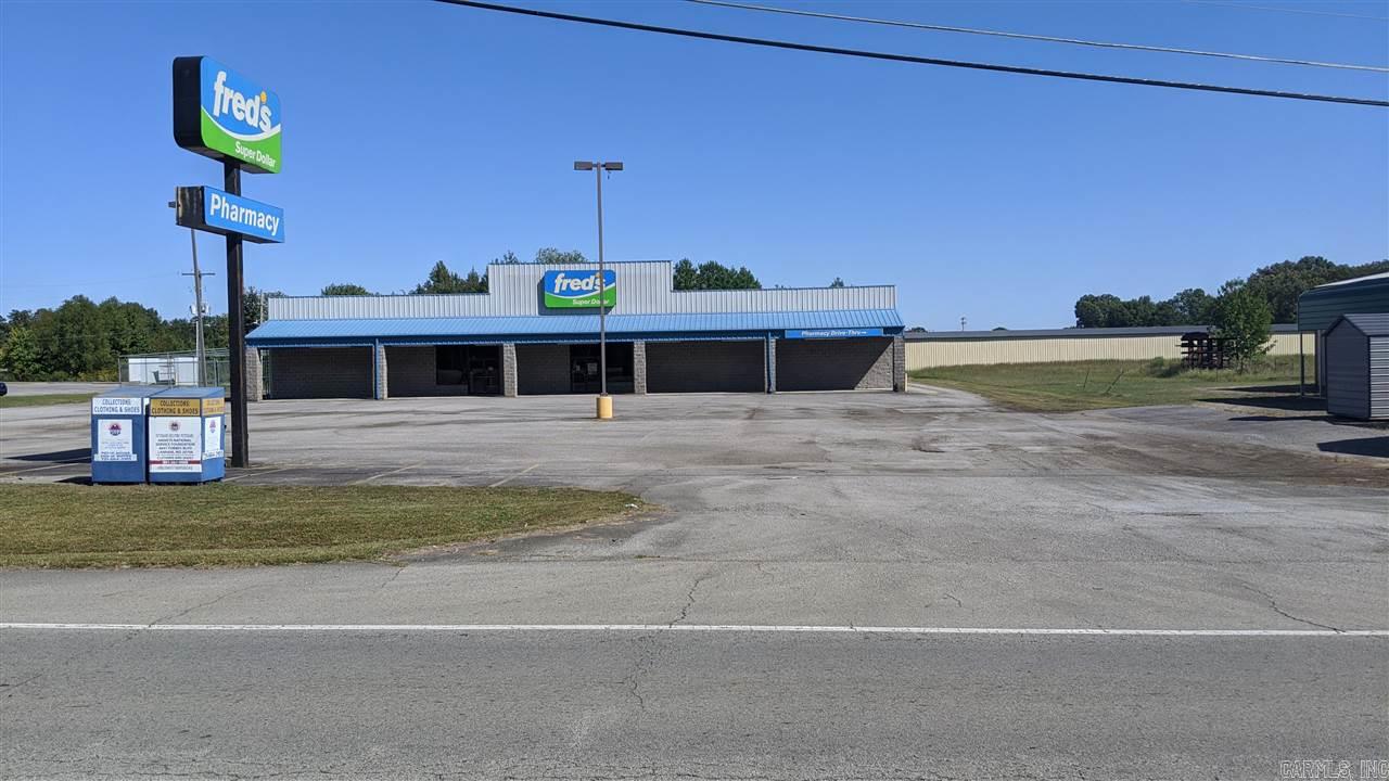 Commercial property with perfect location with high traffic count. Many possibilities for this property. Building was Fred's Dollar Store previously. Plenty of parking spaces and easy access with highway frontage and close proximity to interstate. See Agent Remarks.