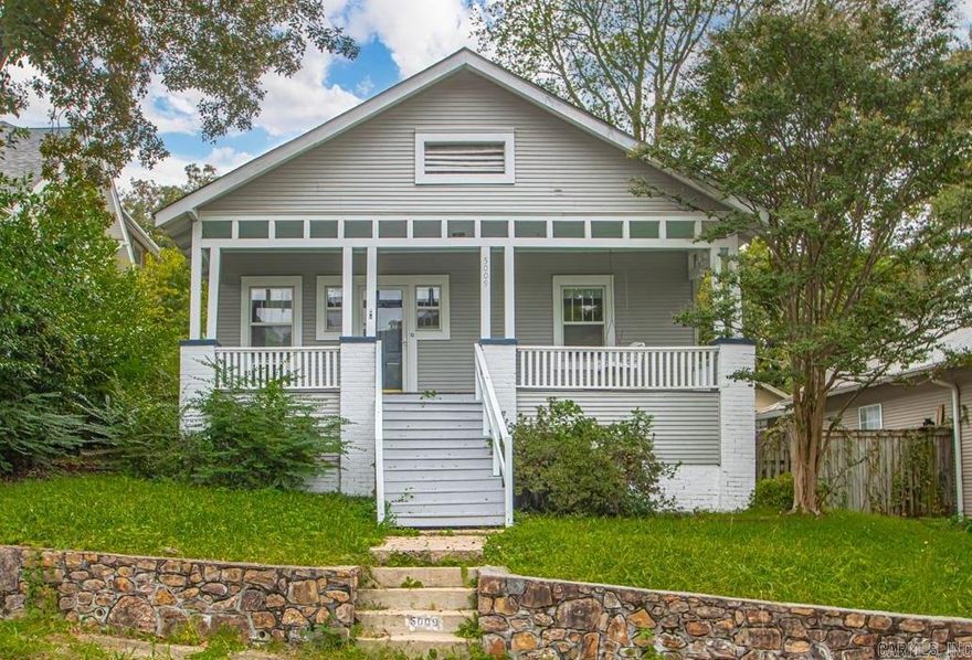 Discover the charm of this historic Hillcrest cottage, perfectly perched on North Lookout just steps from Allsopp Park. Enjoy relaxing on the spacious front porch before stepping into the open living and dining area filled with natural light. Enjoy the primary bedroom with an adjoining bonus room— perfect for a cozy TV room, study, or nursery. French doors open to a beautiful flagstone patio, great for outdoor entertaining. With alley access, a double carport, an additional parking pad, and a fully fenced yard, this home offers both convenience and character in one of Hillcrest’s most desirable locations.